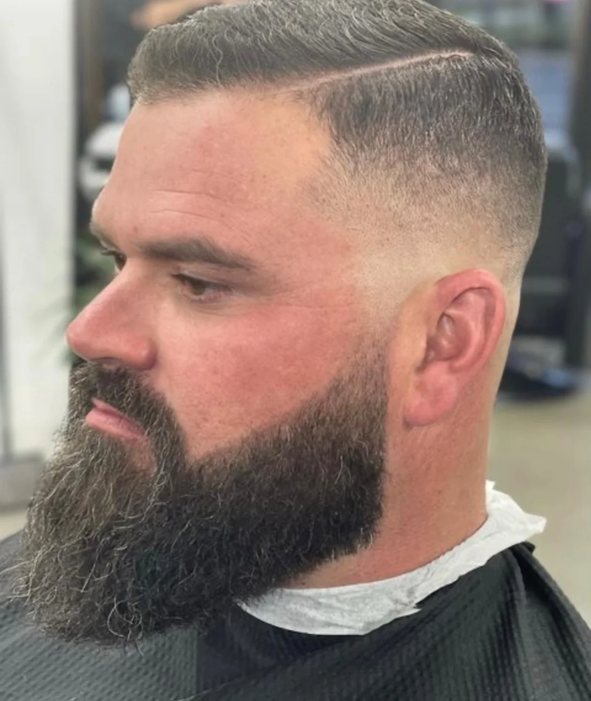 Sharp skin fade haircut at Masters Barber Co.